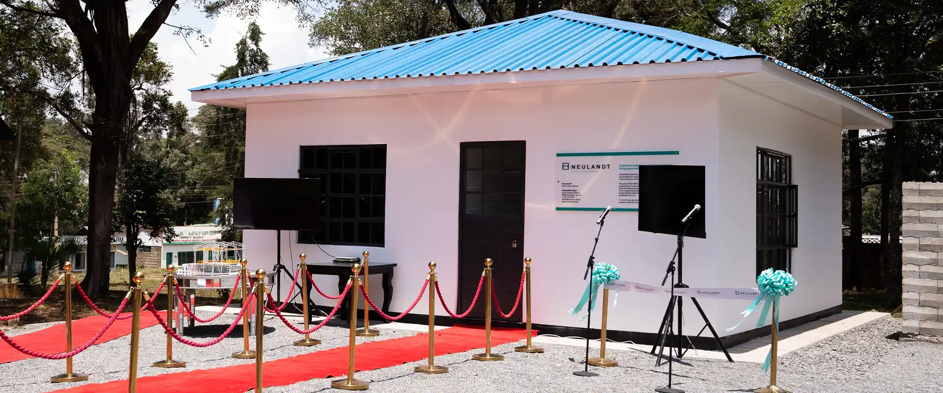 Show house at the NCA show ground in Kenia with a red carpet for the opening ceremony which was built with concrete precast elements